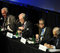 Panelistas respondiendo preguntas del público.